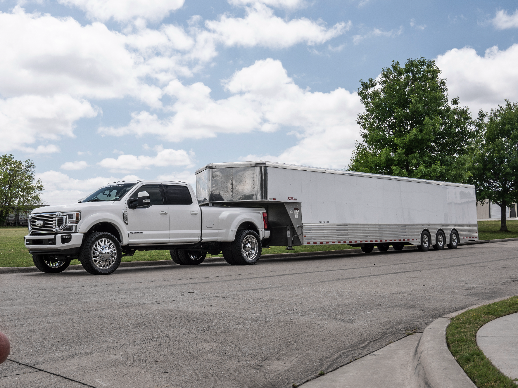 Truck towing long trailer.